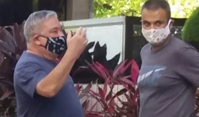 Desembargador que humilhou guardas volta a caminhar de máscara; guardas são homenageados