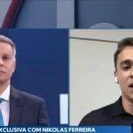 Ao vivo no SBT, Nikolas critica ida de Moraes a evento da emissora